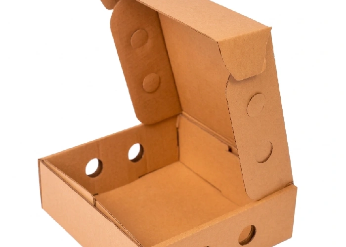 An open brown corrugated cake box showing side air vents